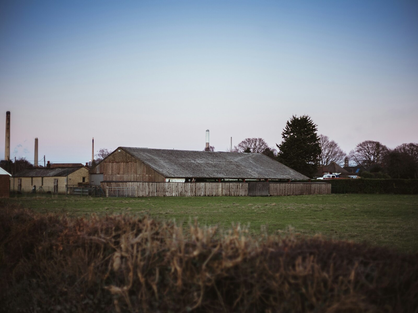 The barn from the farmyard in the evening light